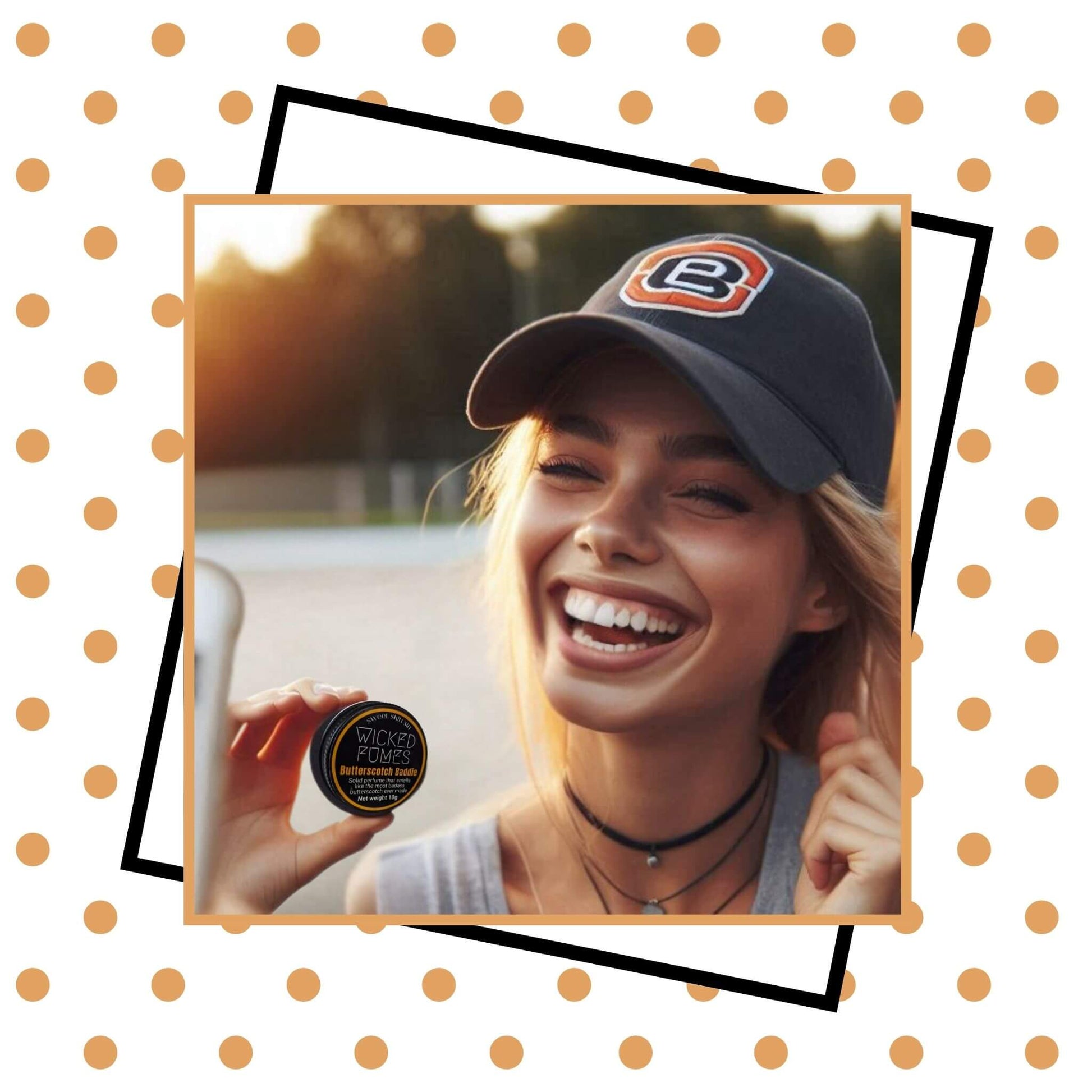 girl laughing and holding butterscotch baddie perfume