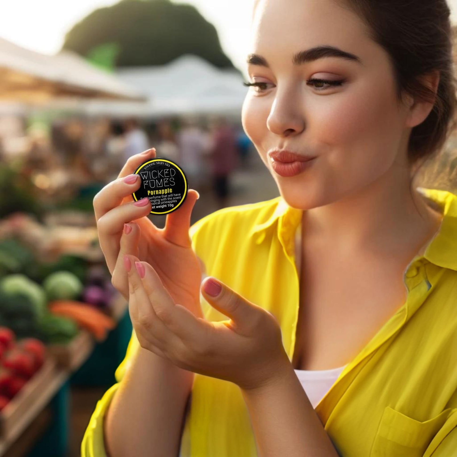 girl holding pineapple solid perfume in market
